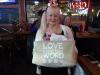 Judy spreads the word - and the word is LOVE! photo by Larry Testerman